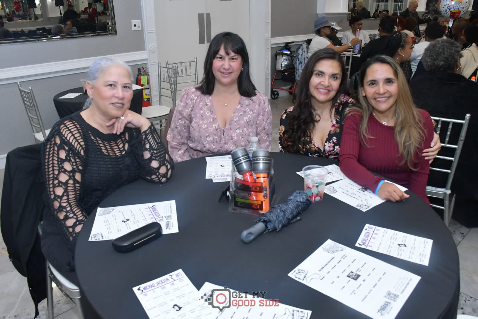 A group of friends at a Take Me Back Bingo night